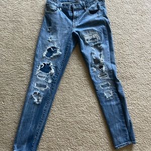 Guess mid rise ripped jeans